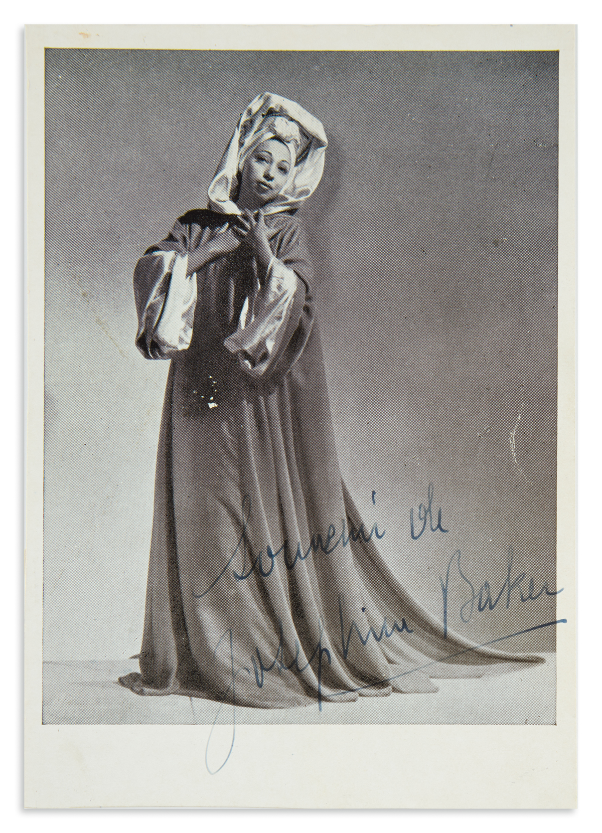 BAKER, JOSEPHINE. Photograph Signed and Inscribed, Souvenir de / Josephine Baker,